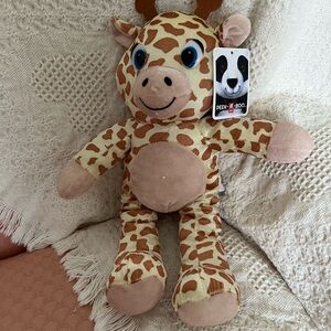 New with tag Peek-a-boo plush toy giraffe.